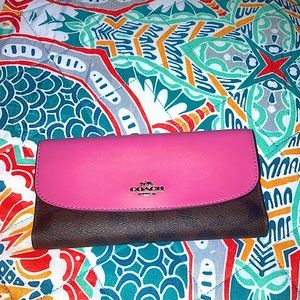 Authentic Coach wallet. Only used briefly before getting a new one for my mom.